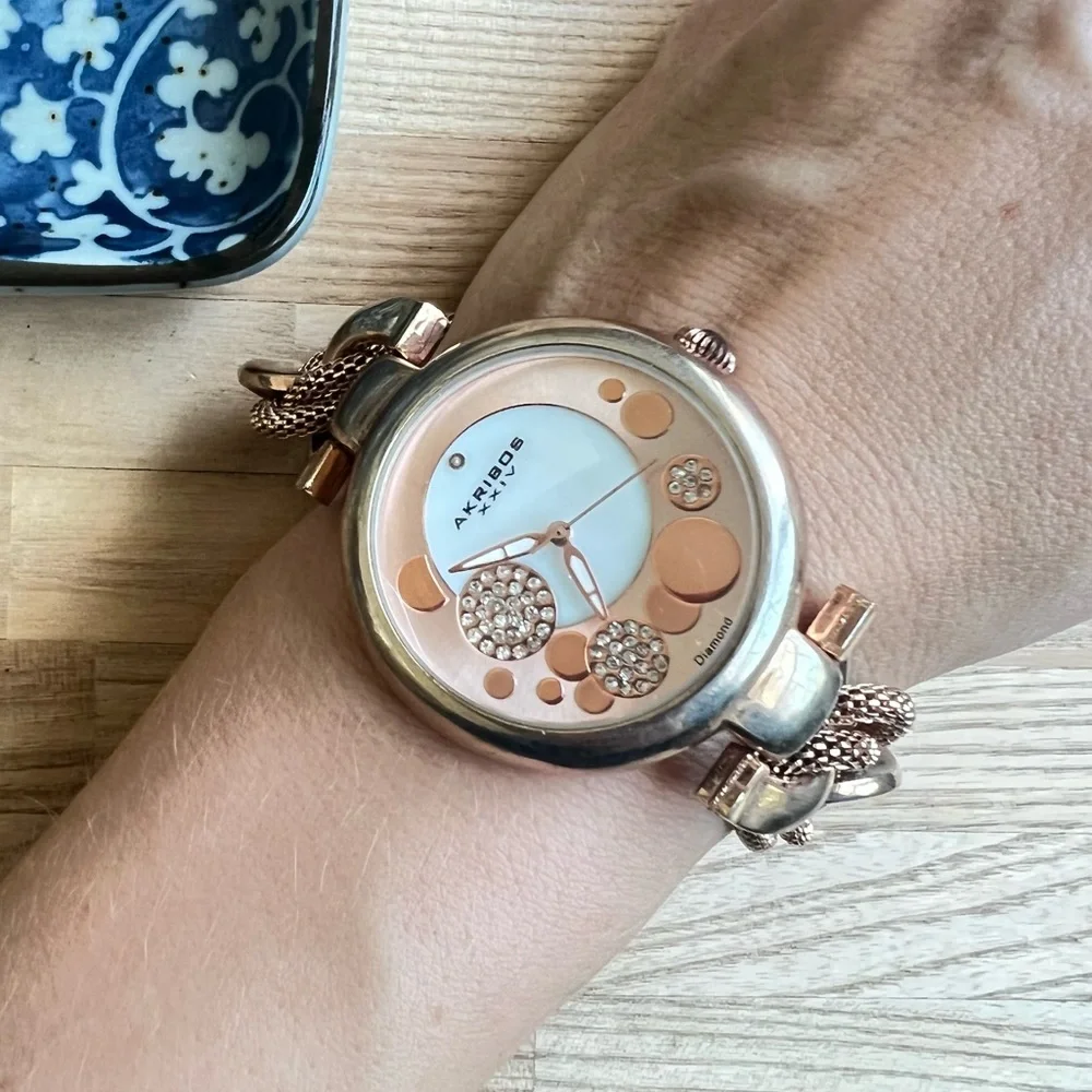 Akribos XXIV ladies rose gold tone fashion bracelet watch NEW BATTERY